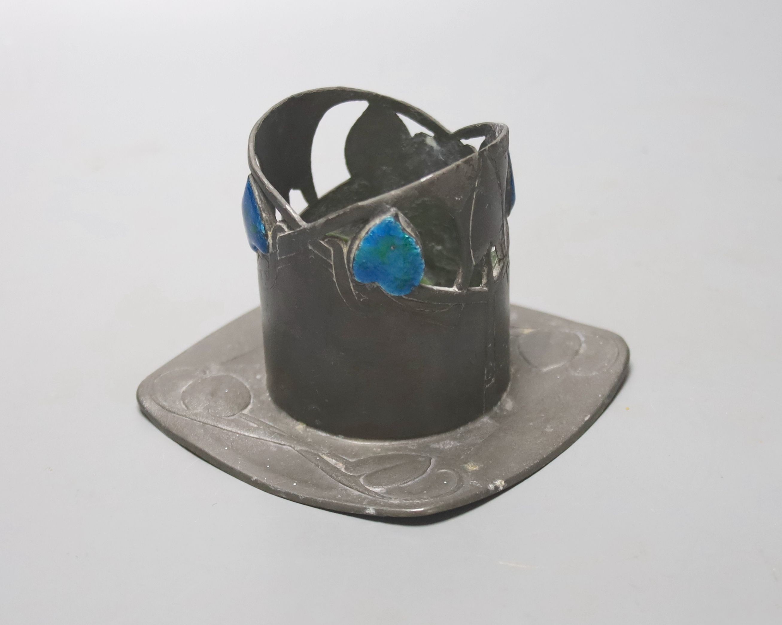 A Libertys Tudric enamelled pewter stand, H7cm, remnants of glass